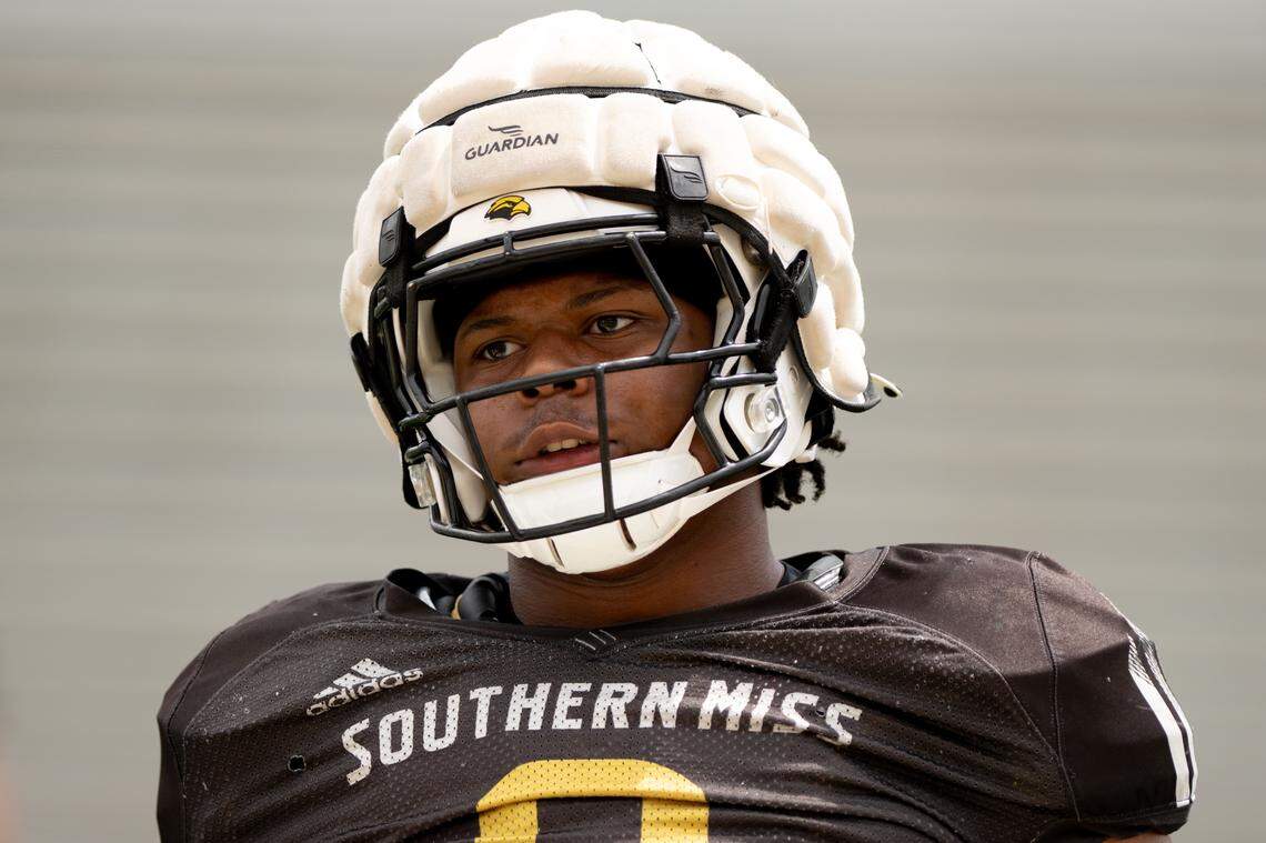 Southern Miss linebacker Caleb Triplett (0) walks onto the field during the Southern Miss Spring Football Showcase.