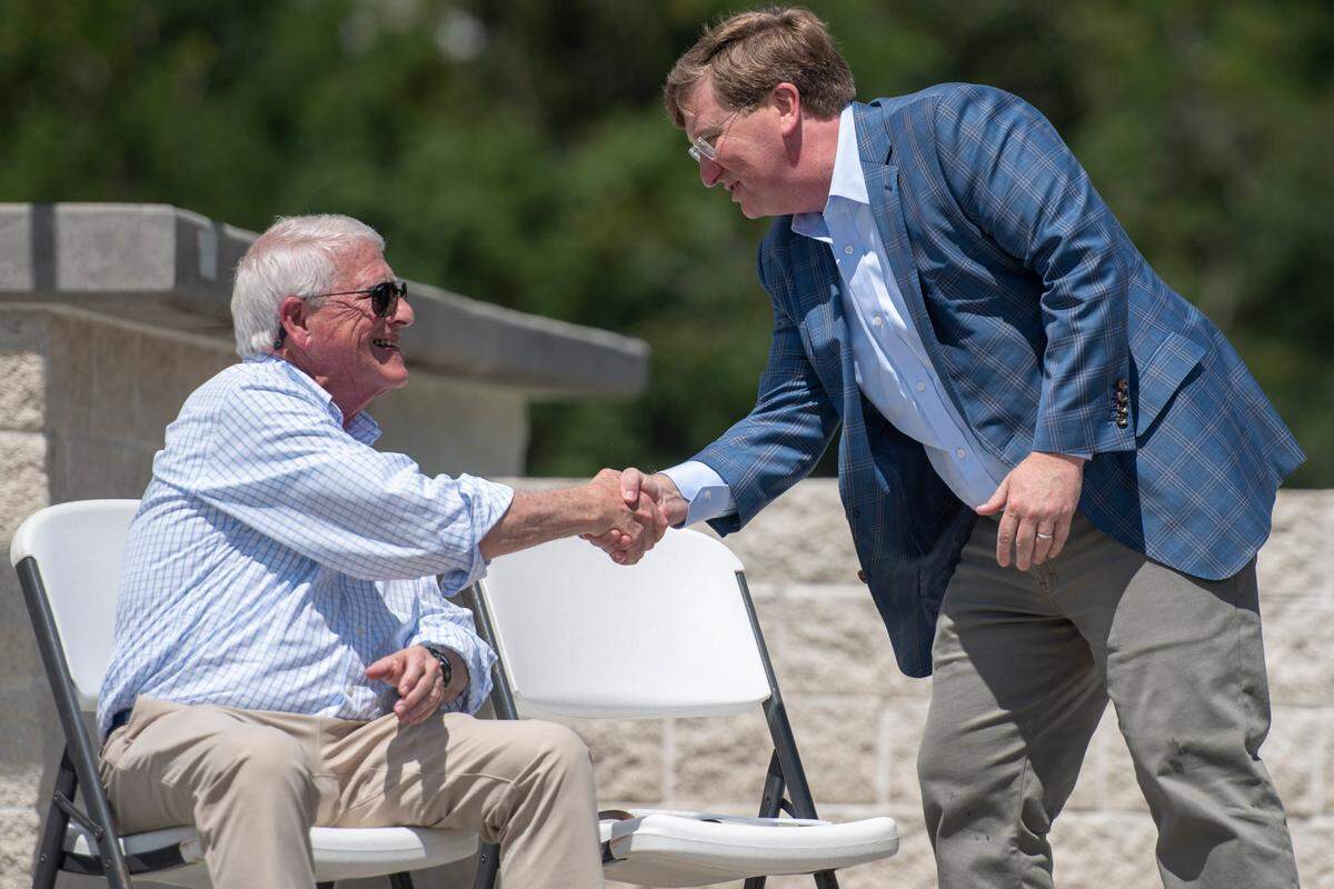 U.S. Sen. Roger Wicker, left, and Gov. Tate Reeves shake hands after an event on the anniversary of Hurricane Katrina at Fort Maurepas Park in Ocean Springs on Monday, Aug. 29, 2022.