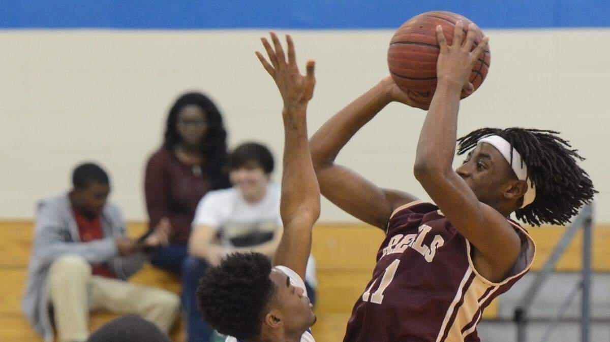 WILLIAM COLGIN/SPECIAL TO THE SUN HERALD 
 LaRaymond Spivery helped lead George County past Pearl 64-61 and into the Class 6A State Tournament quarterfinals.