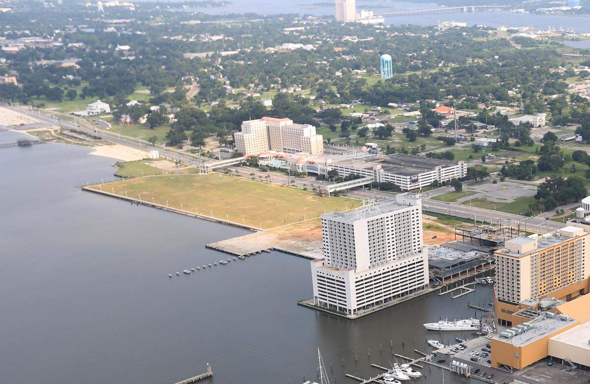 A $750 million casino resort with convention center is proposed for the former Tivoli Hotel site on Casino Row in East Biloxi. The site, from this  aerial in 2015, is the wooded area to the left of Harrah’s Gulf Coast (the tan and white building north of U.S. 90) and the former Biloxi Yacht Club. 