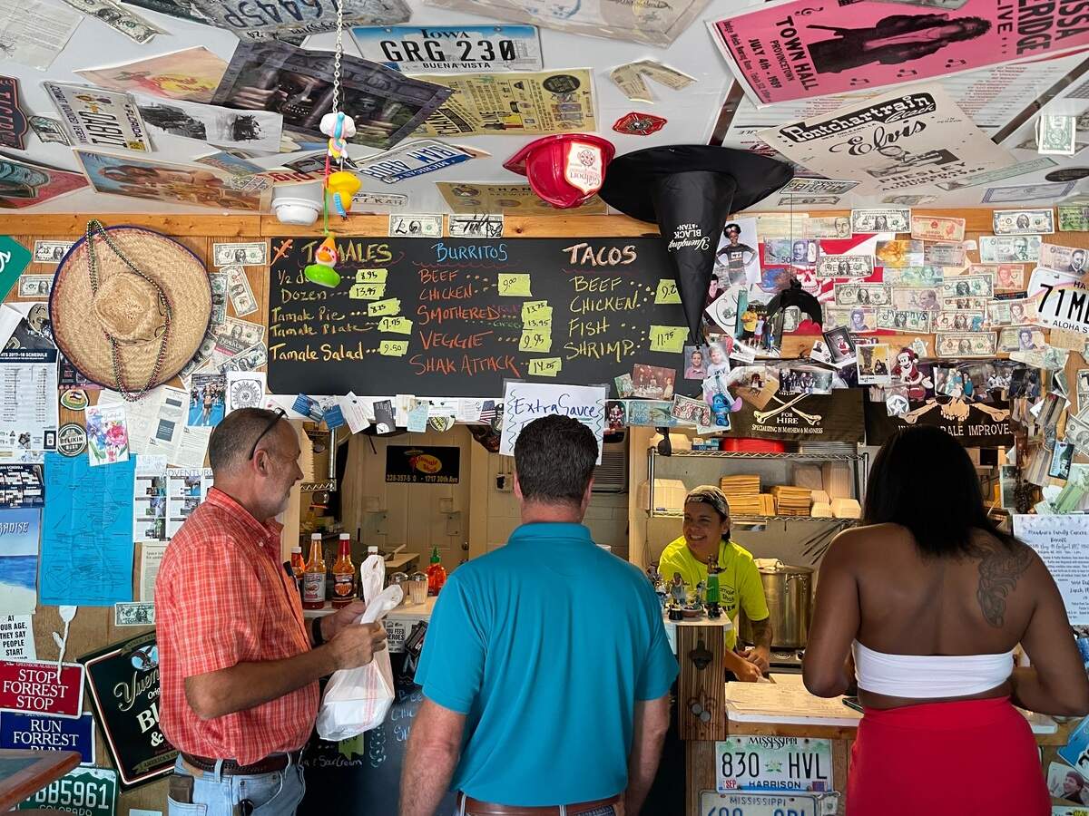 Customers order and pick up food at Tamale Shak on 30th Avenue in Gulfport.