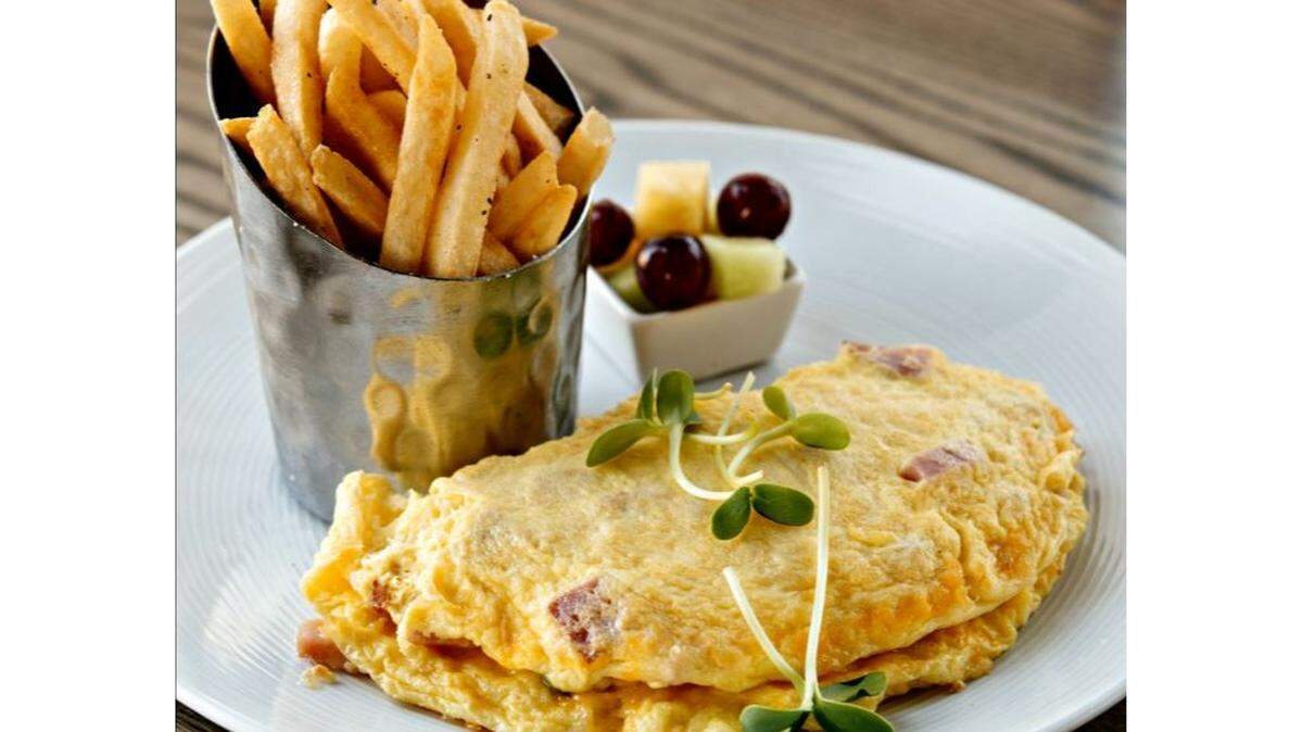 A ham and cheese omelet with fries and fruit will be one of the breakfast specialties on the menu the new Brick & Spoon restaurant opening Monday outside Edgewater Mall in Biloxi.