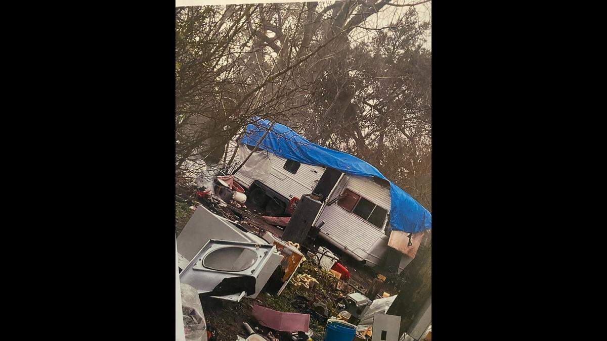 A camper filled with mold and mildew is where Hancock County sheriff’s deputies seized some of the nine mixed breed Bullador dogs after a report of alleged animal cruelty.