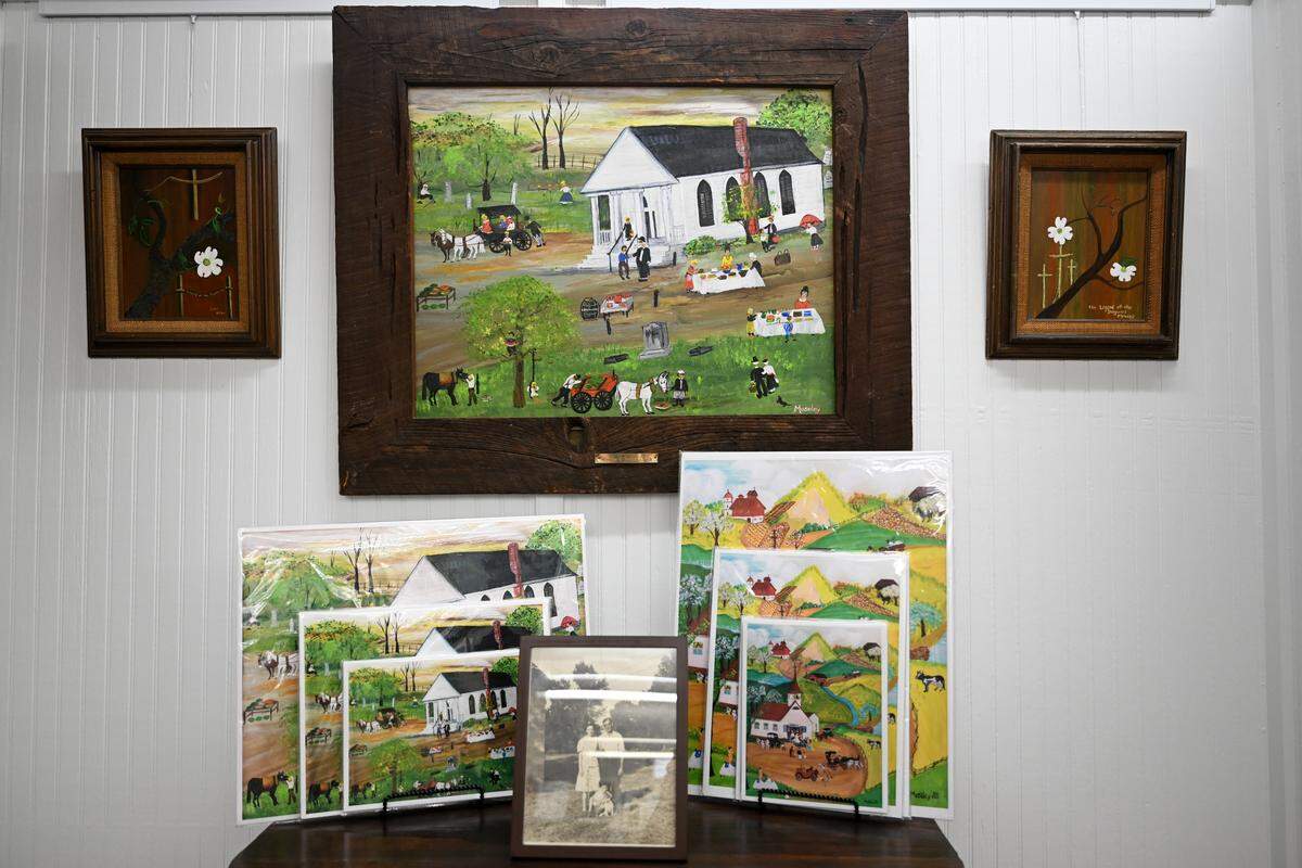 Paintings by Alice Moseley are displayed at the Alice Moseley Folk Art Museum in Bay St. Louis on Wednesday, Aug. 27, 2025.
