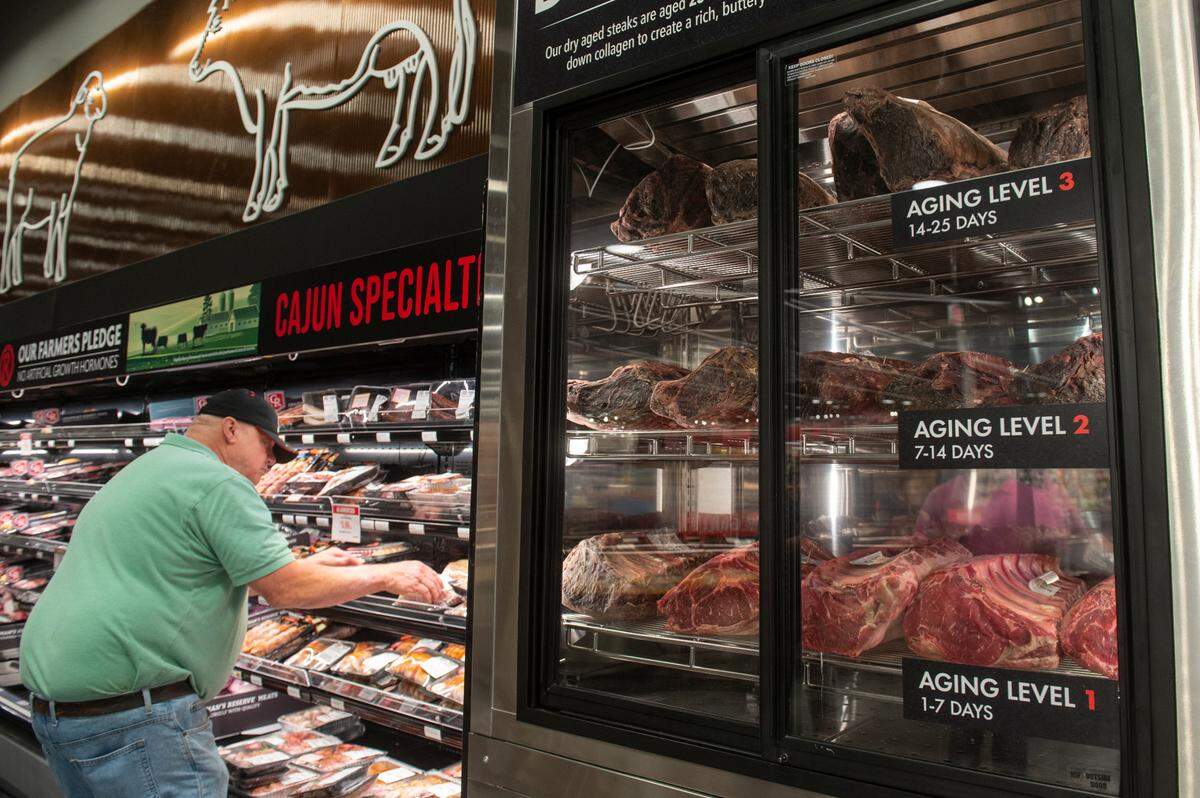 A custom dry-aged beef locker that ages USDA Choice Angus Beef in the butcher shop section at the new Rouses Market location on Pass Road in Biloxi on Tuesday, Oct. 15, 2024.