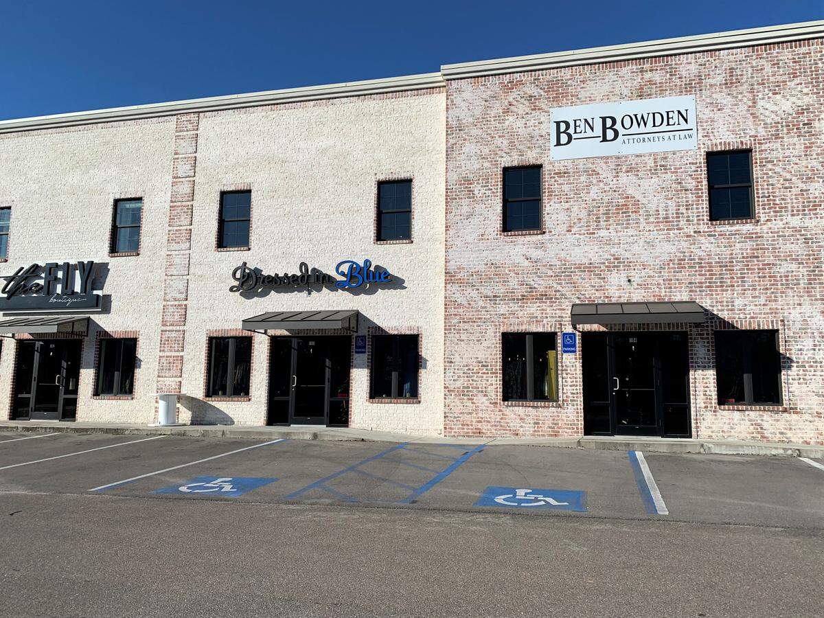 A law office and two boutiques share this building along Cowan Road in Gulfport. Many of the developers have followed the same design for a unified look along the road that leads from I-10 to the beach.
