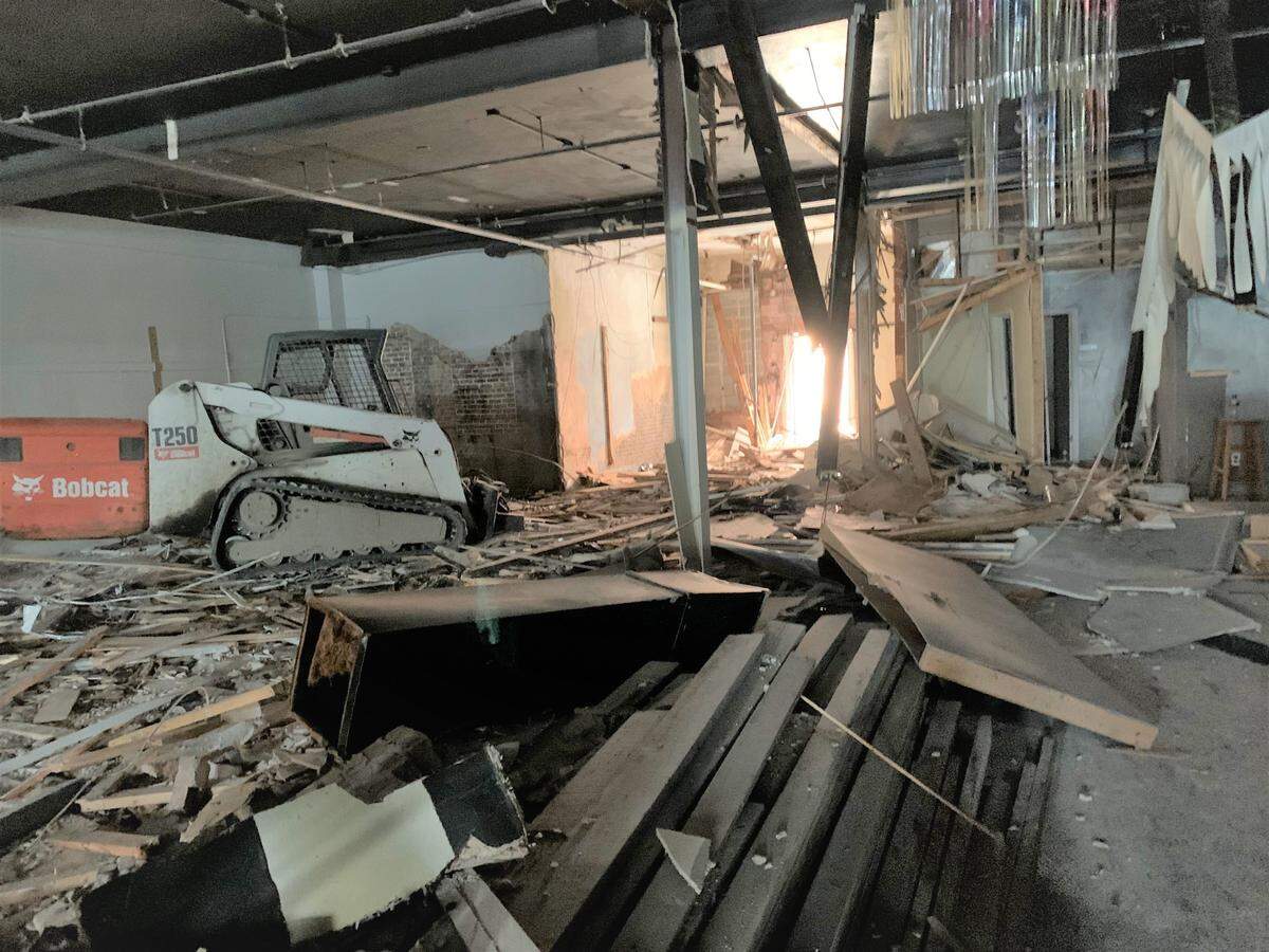 Layers of construction materials were removed during the interior demo to take the building down to its brick and steel beginnings. The mixed use development will have businesses on the first floor and apartments on the top two floors, plus an events venue.