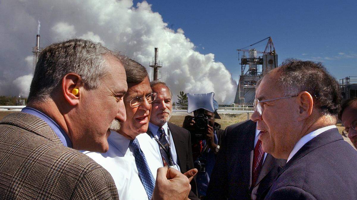 SUN HERALD FILE PHOTO 
 During a 520-second Space Shuttle Main Engine test at Stennis Space Center in Hancock County in 2002, then NASA Administrator Sean O'Keefe, far right, has a look around the testing facility while U.S. Senator Trent Lott, left, and David Geiger with Boeing, center, watch the engine test.