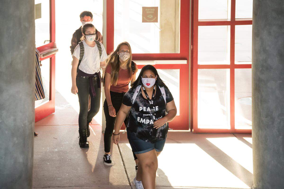 Students entering Biloxi High School on their first day amid the COVID-19 pandemic on August 5th, 2020