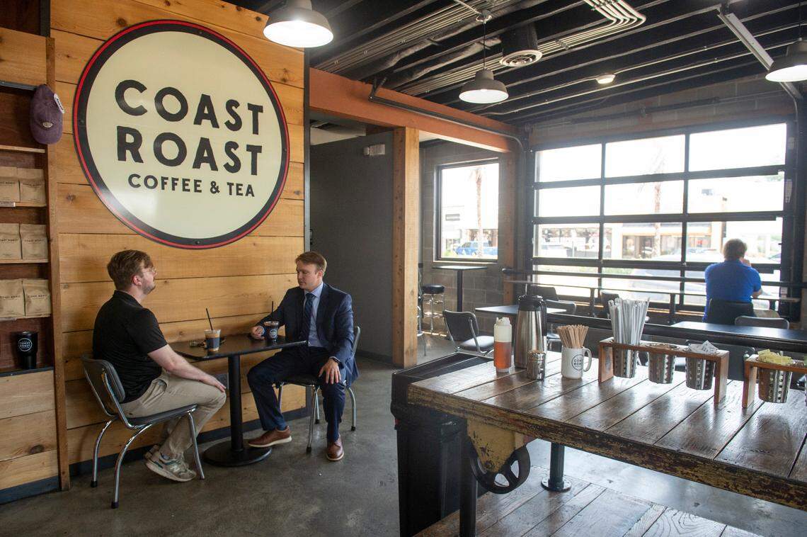 Customers work remotely at Coast Roast in Gulfport on Tuesday, May 20, 2025.
