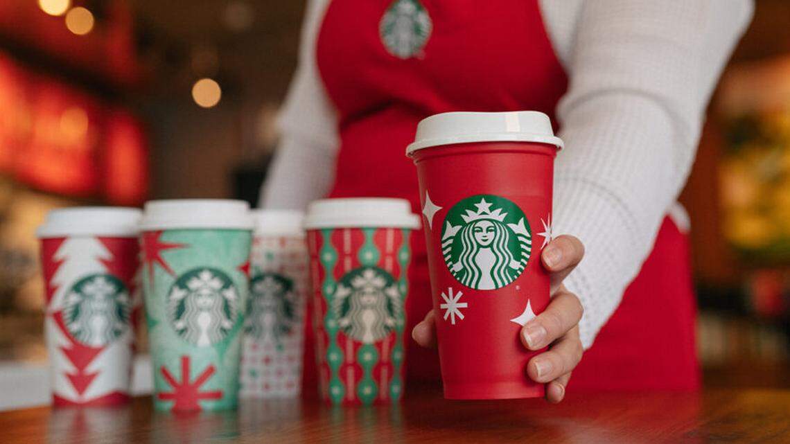 On Red Cup Day, Starbucks customers can get a reusable red cup with the purchase of any handcrafted holiday beverage, while supplies last.