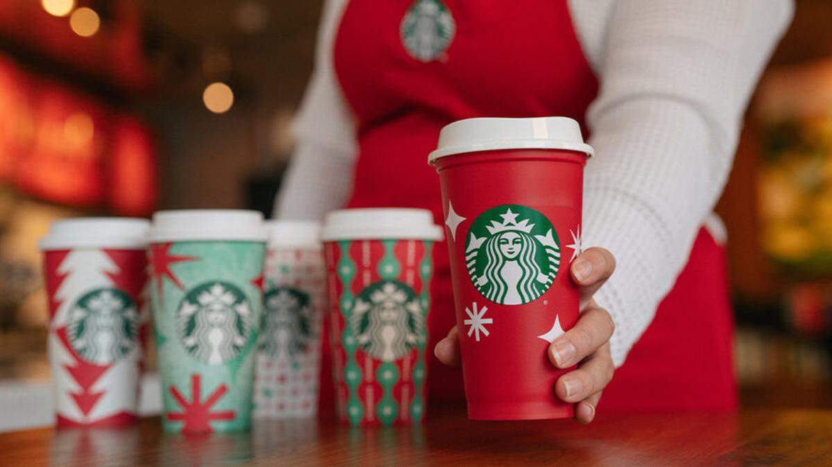 On Red Cup Day, Starbucks customers can get a reusable red cup with the purchase of any handcrafted holiday beverage, while supplies last.