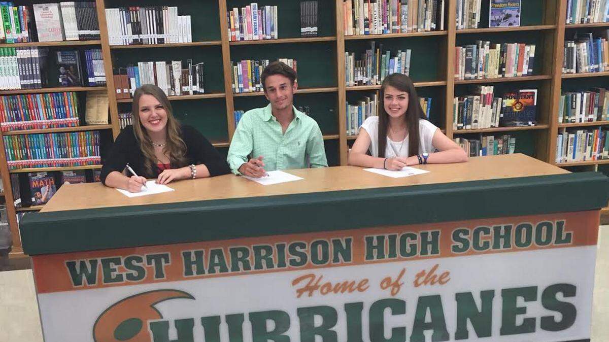 SUBMITTED 
 West Harrison High School held a signing ceremony Thursday for its soccer standouts. Brooke Fritts signed with Southwest Mississippi Community College, Jonathan Page signed with Mississippi Gulf Coast Community College and Summer Hansen signed with William Carey. Tylor Davis, not shown, also signed with MGCCCC.