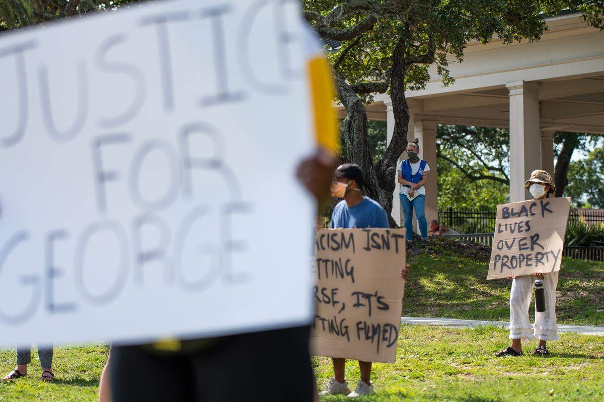 Peaceful protesters lined the sidewalk of Beach Boulevard in Biloxi on Sunday, May 31st, 2020, to demonstrate against police brutality. The protest was one of hundreds taking place across the country following the death of George Floyd.