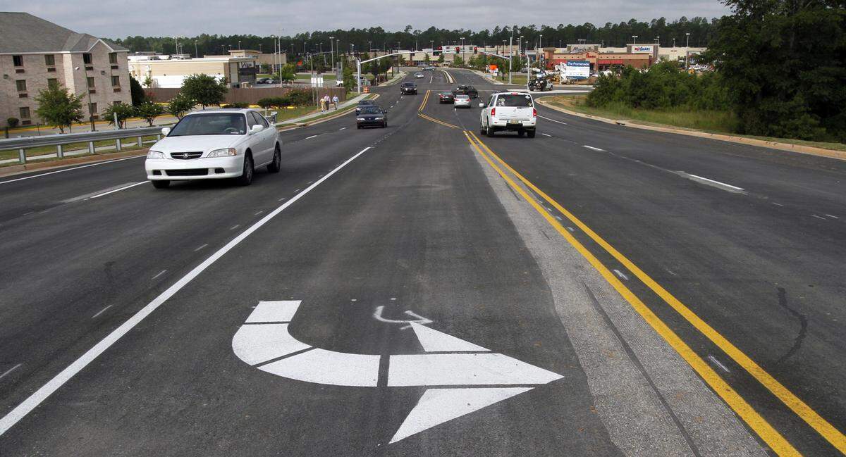 Traffic crosses the bridge bridge connecting the Promenade with Walmart shopping center in D’Iberville, easing traffic in that area of the city.