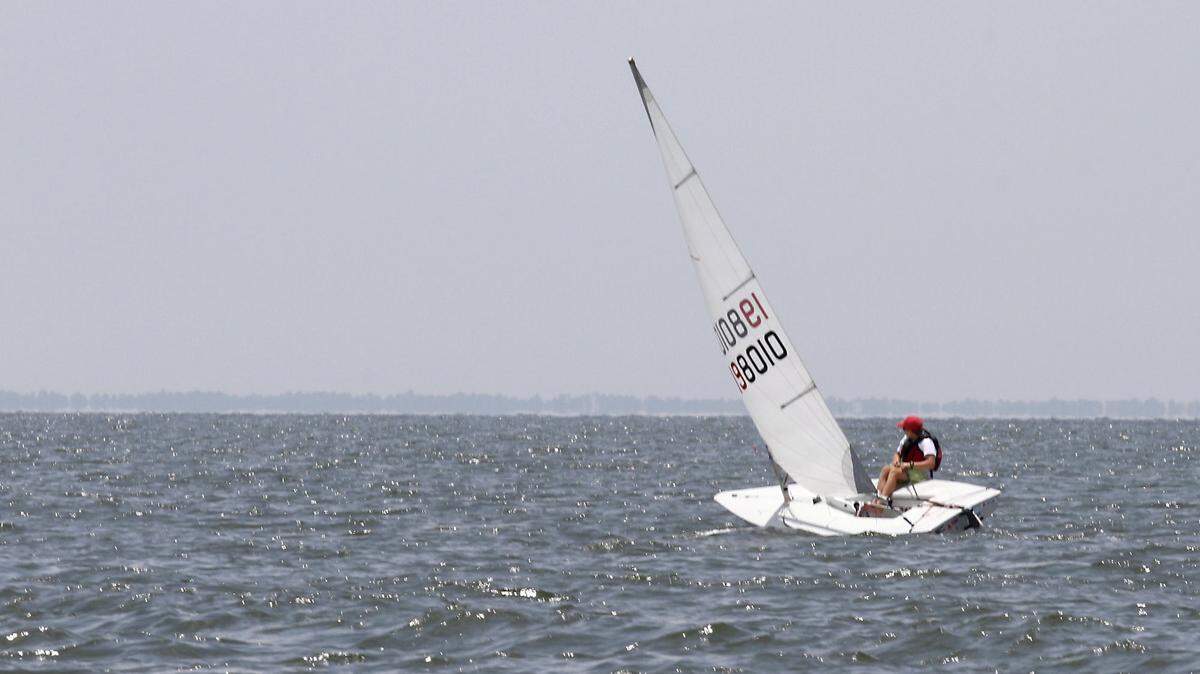 TIM ISBELL/SUN HERALD 
 Crockett Collier of the Gulfport Yacht Club pilots his laser during the Weatherly Regatta and Leukemia Regatta, on July 25.