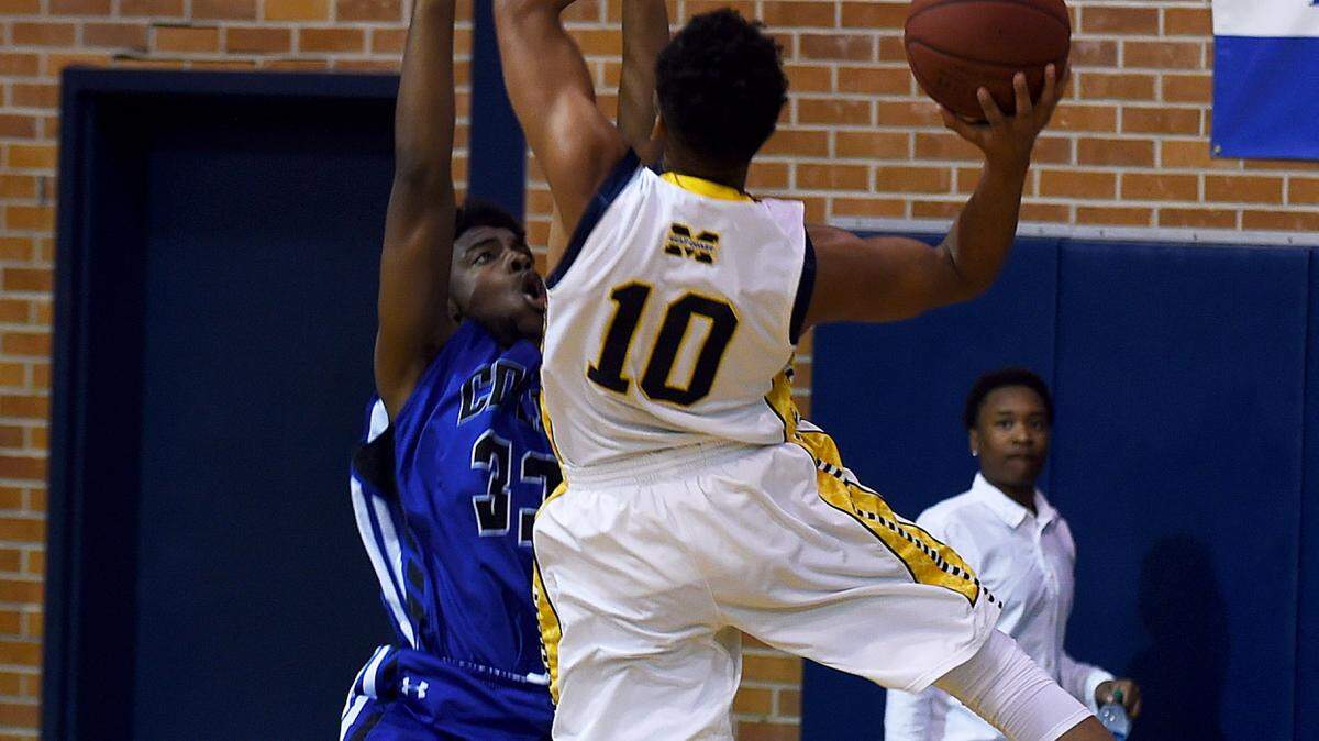 RICH KOPP/MGCCC 
 Mississippi Gulf Coast point guard Deshawn Jones drives for a bucket against Copiah-Lincoln on Thursday in Perkinston.