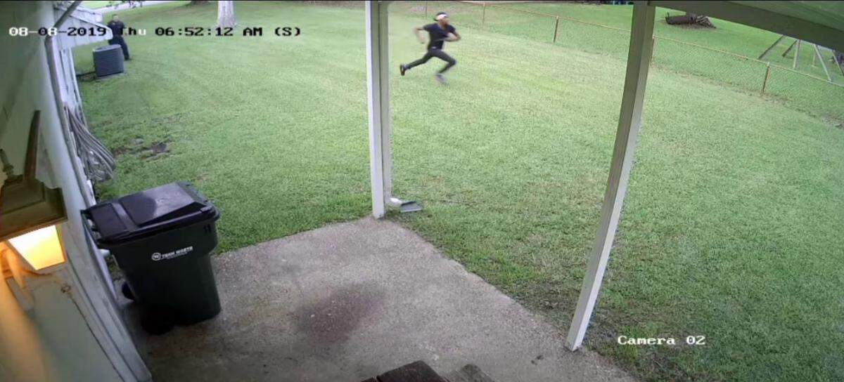 Toussaint Diamon Sim is dressed in black and running with a loaded 9mm semi-automatic pistol with an extended magazine in his right hand when he is shot and killed by Moss Point Police Sgt. Lancen Shipman the evening of Aug. 8, 2019..
