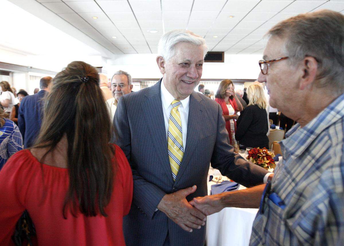 Supporters and friends thanks George Schloegel for his term as Gulfport’s mayor in a celebration at the Great Southern Club.