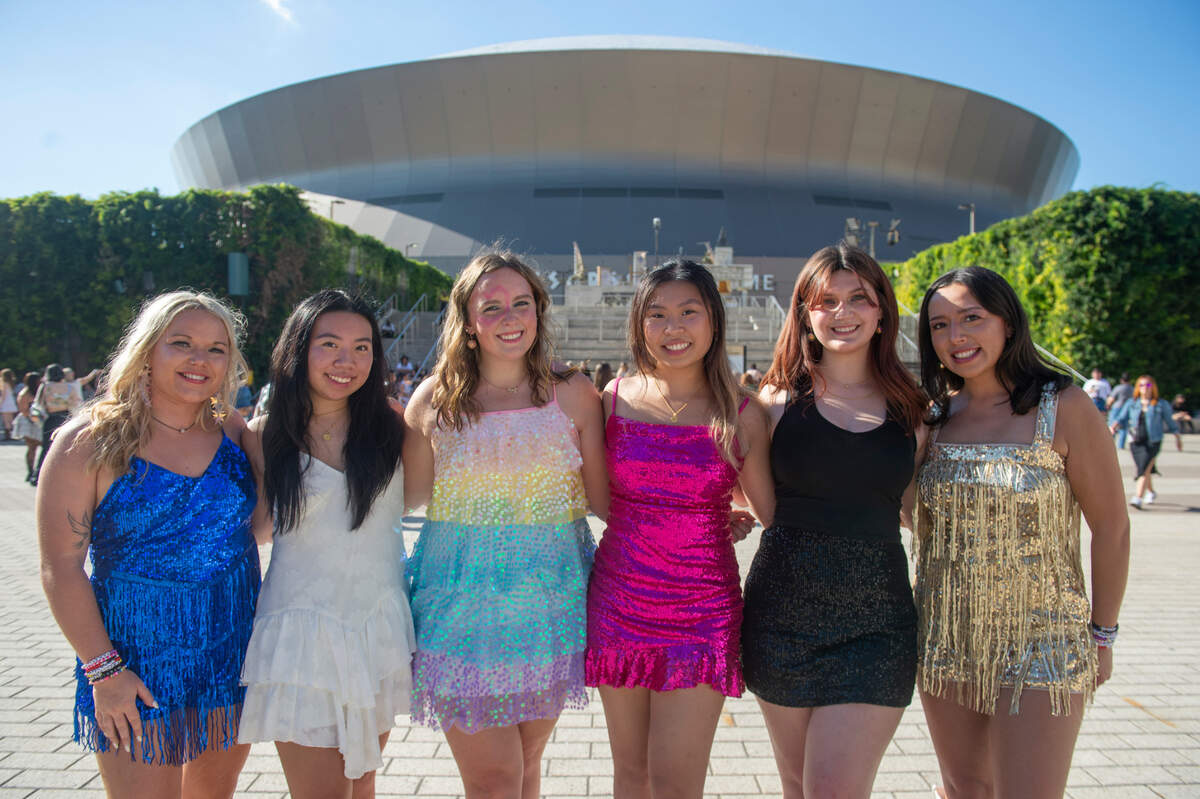 Fans show off their outfits outside the Cesars Superdome in New Orleans on Friday, Oct. 25, 2024, before Taylor Swift’s Eras Tour performance that night.