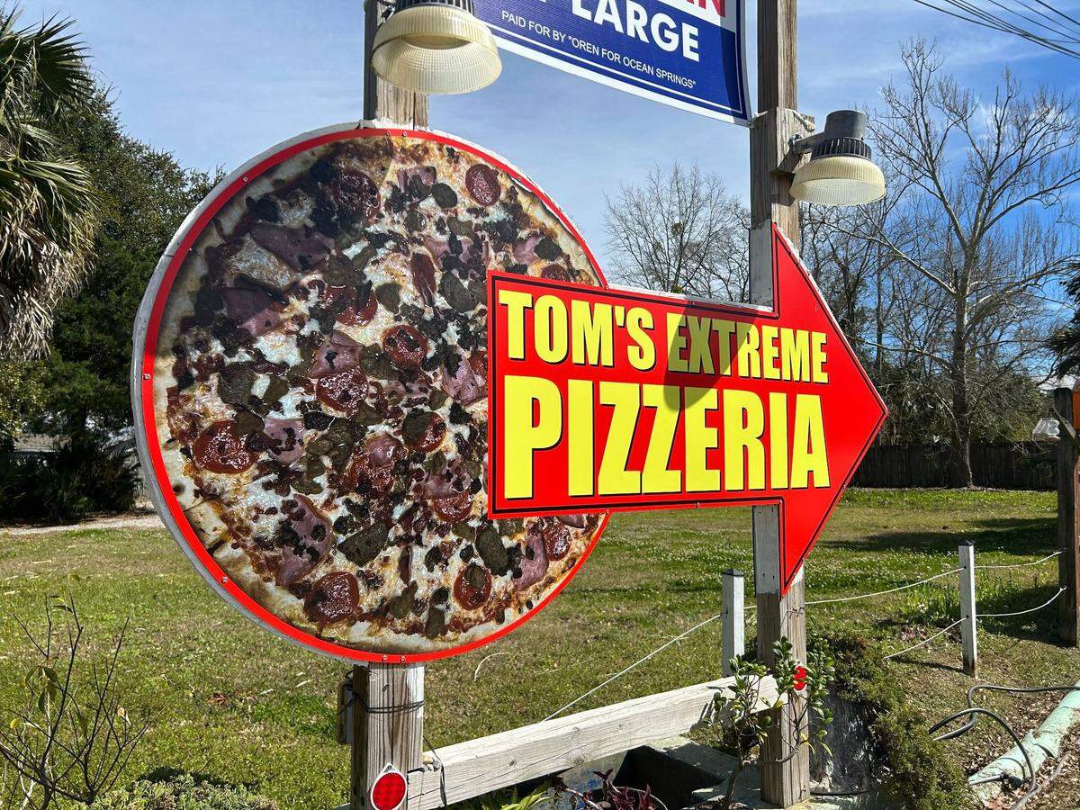 Tom’s Extreme Pizzeria in Ocean Springs, Mississippi allows you to design your own pizza with nearly 50 different toppings.