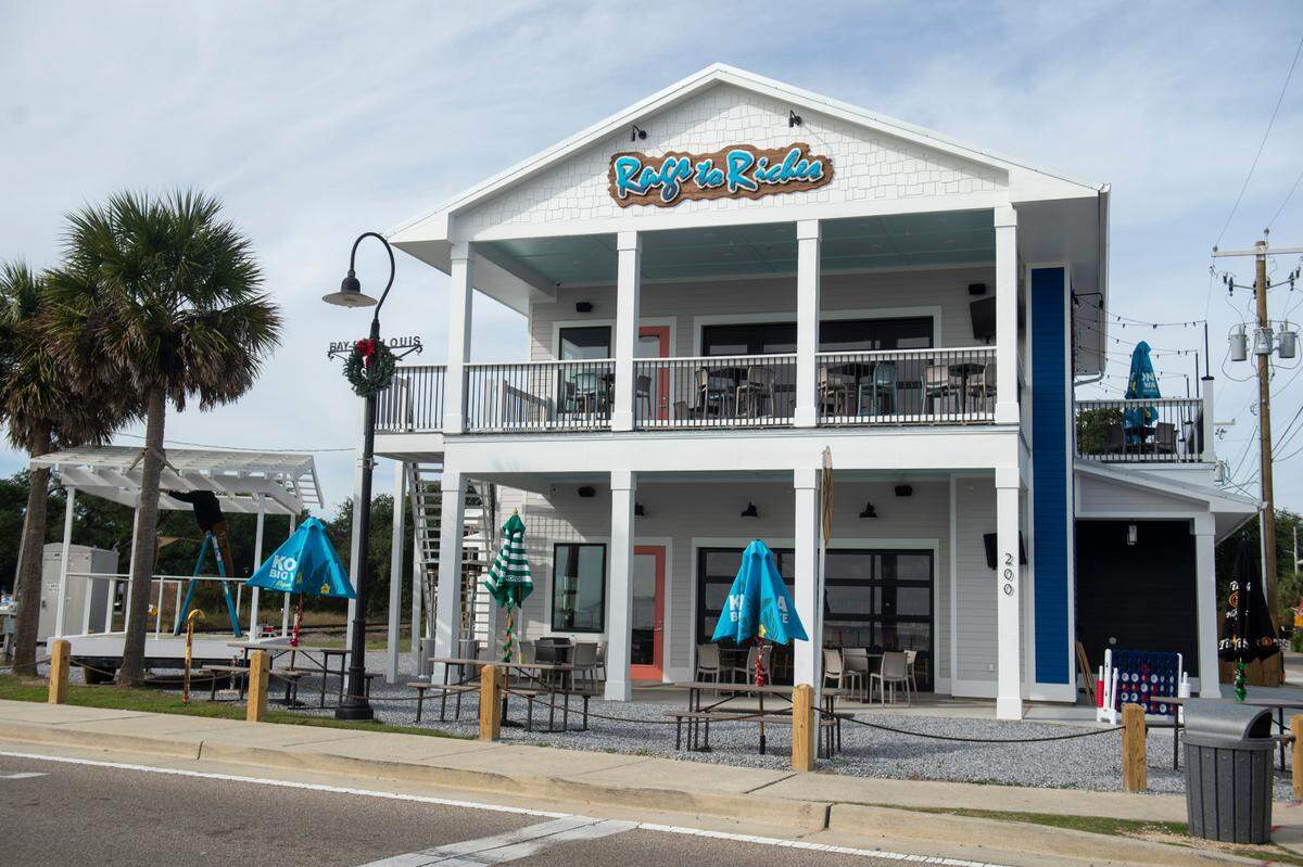 Rags to Riches in Bay St. Louis on Thursday, Dec. 7, 2023. The two-story bar features a sports bar atmosphere on the first floor and a relaxed wine bar atmosphere on the second floor.