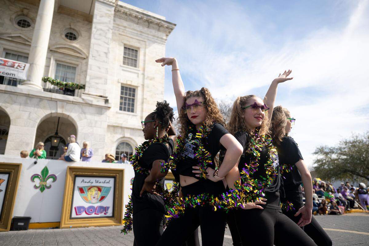 Dancers from the Next Level Dance Company dance outside City Hall.