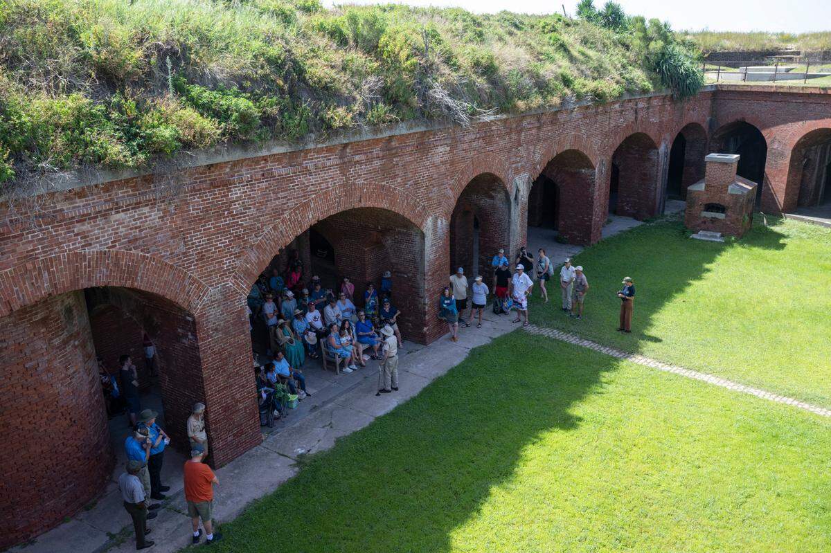 Jack Madison, a volunteer tour guide for Gulf Islands National Seashore, gives one final tour of Fort Massachusetts on Ship Island on Friday, July 11, 2025 — his 100th birthday.