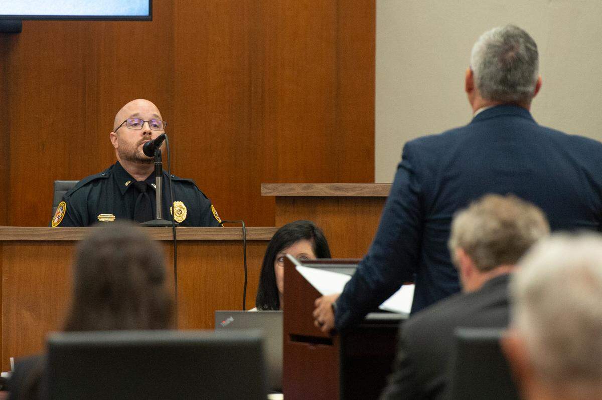 Assistant District Attorney Billy Stage asks questions of Biloxi Police Officer Brandon Clark as he sits on the witness stand during Pitipong Daengbunga’s trial for the murder death of Jamie Boggs in Harrison County Circuit Court on Tuesday, Aug. 13, 2024.