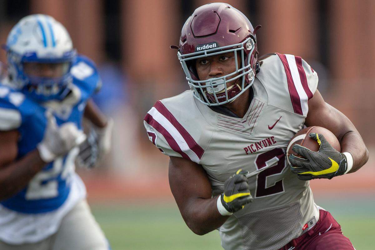 Picayune runningback Dante Dowdell runs the ball down the field during a spring game against Ocean Springs at Greyhound Stadium in Ocean Springs on Friday, May 13, 2022.