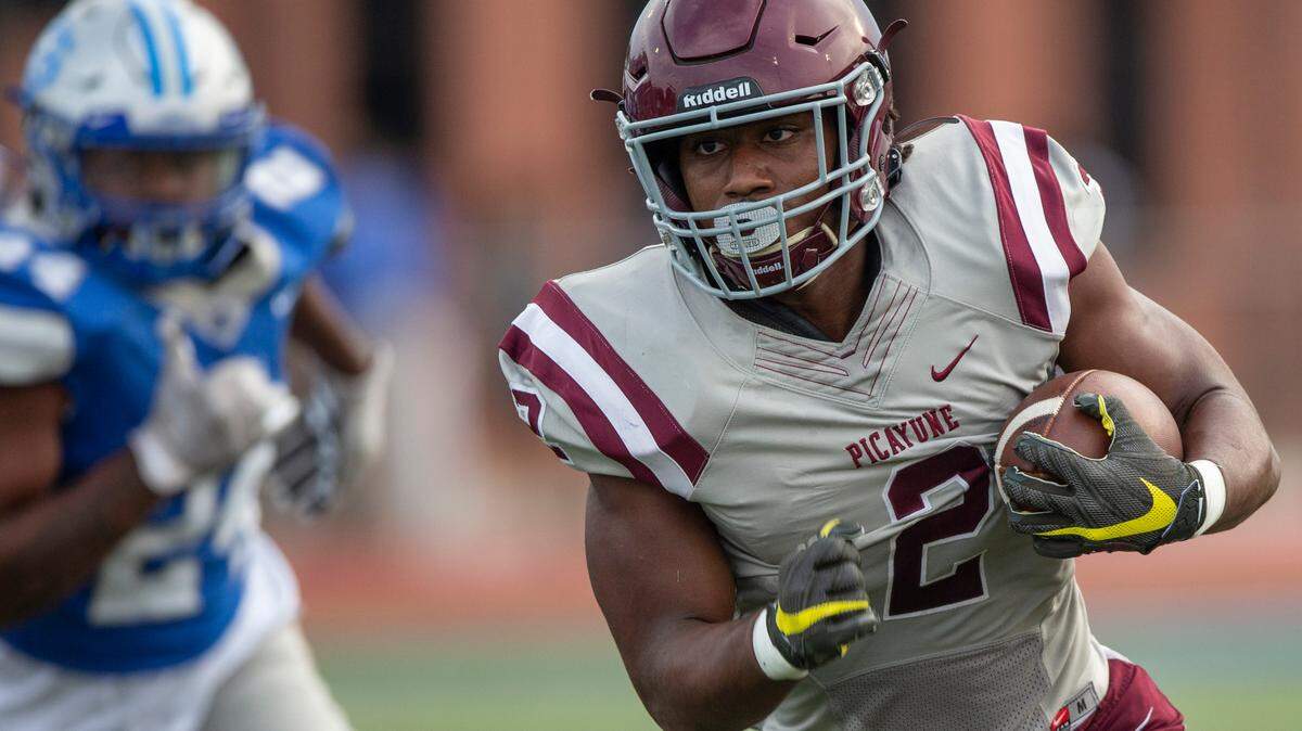Picayune runningback Dante Dowdell runs the ball down the field during a spring game against Ocean Springs at Greyhound Stadium in Ocean Springs on Friday, May 13, 2022.