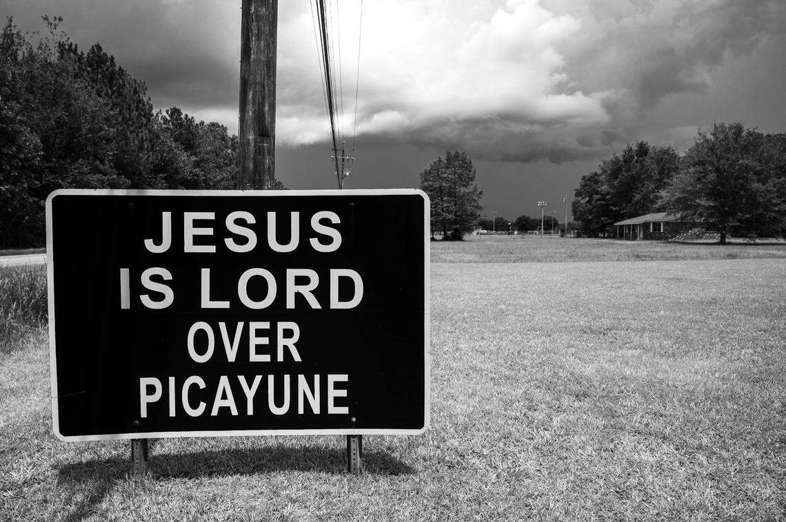 A roadside sign at the edge of Picayune reads “Jesus is Lord over Picayune” on Saturday, Aug. 15.