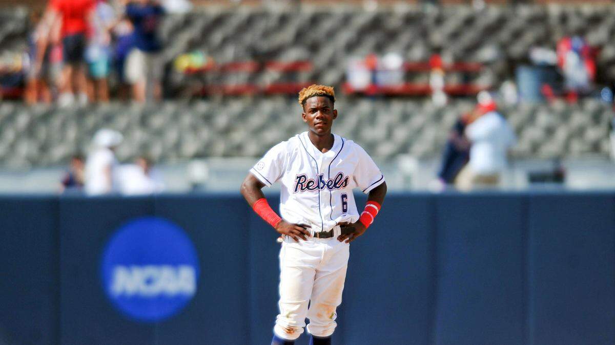 BRUCE NEWMAN/ASSOCIATED PRESS 
 Ole Miss' Errol Robinson (6) watches after the Rebels' 6-5 loss to Tulane in an NCAA regional college baseball tournament game at Oxford-University Stadium Saturday. Ole Miss went two and out.