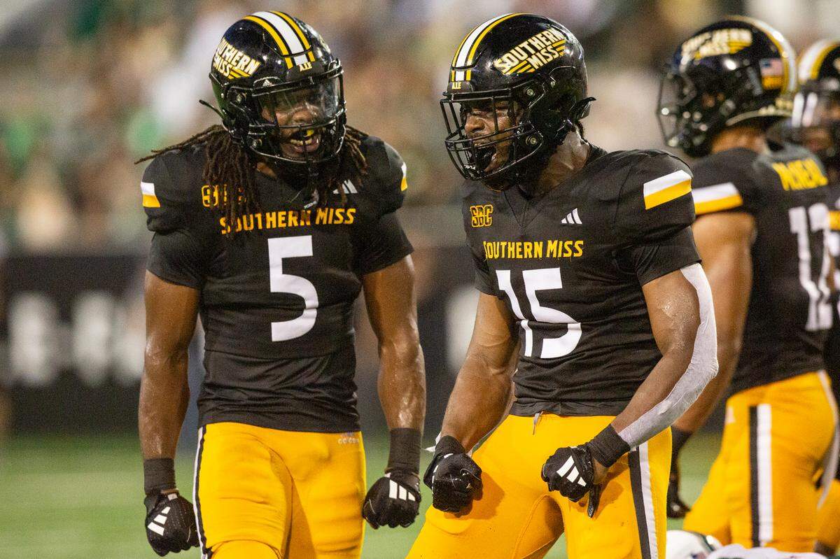 Southern Miss Golden Eagles safety Jay Jones (5) and Southern Miss Golden Eagles linebacker Ja’Len Sims (15) react after a play during a game between Southern Miss and South Florida at M.M. Roberts Stadium in Hattiesburg on Saturday, Sept. 14, 2024.