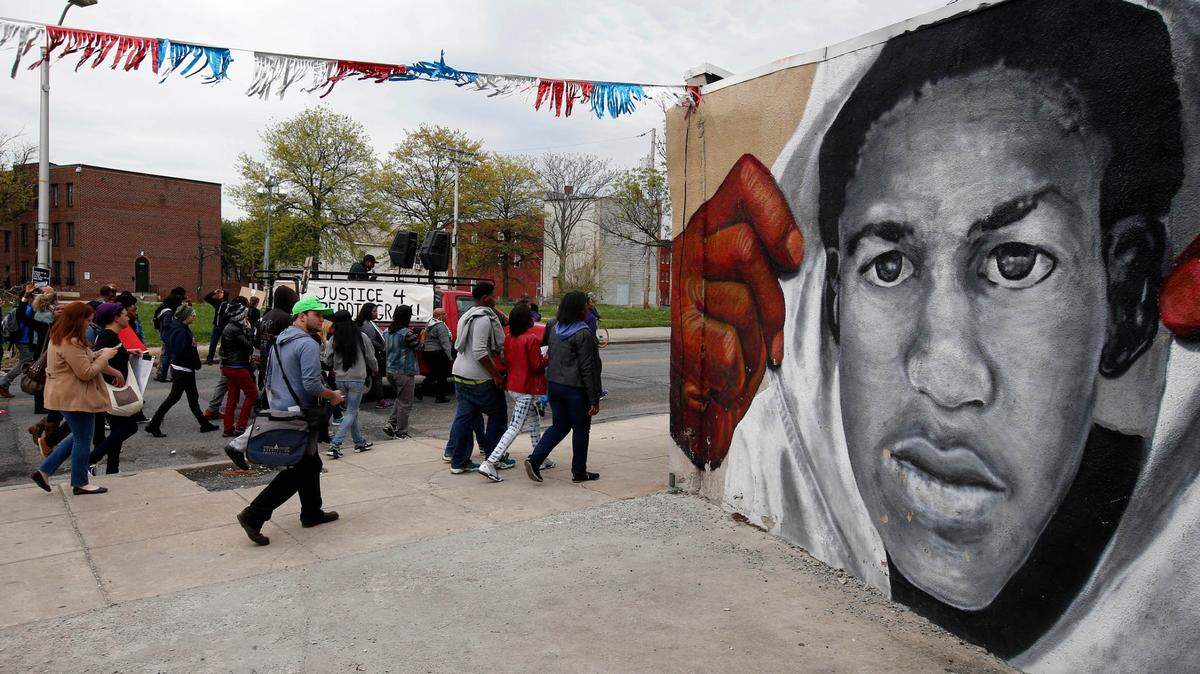 A mural with a likeness of Trayvon Martin. Fort Valley State University is investigating claims that a business professor made comments that trivialized Martin’s death. (AP Photo/Alex Brandon)
