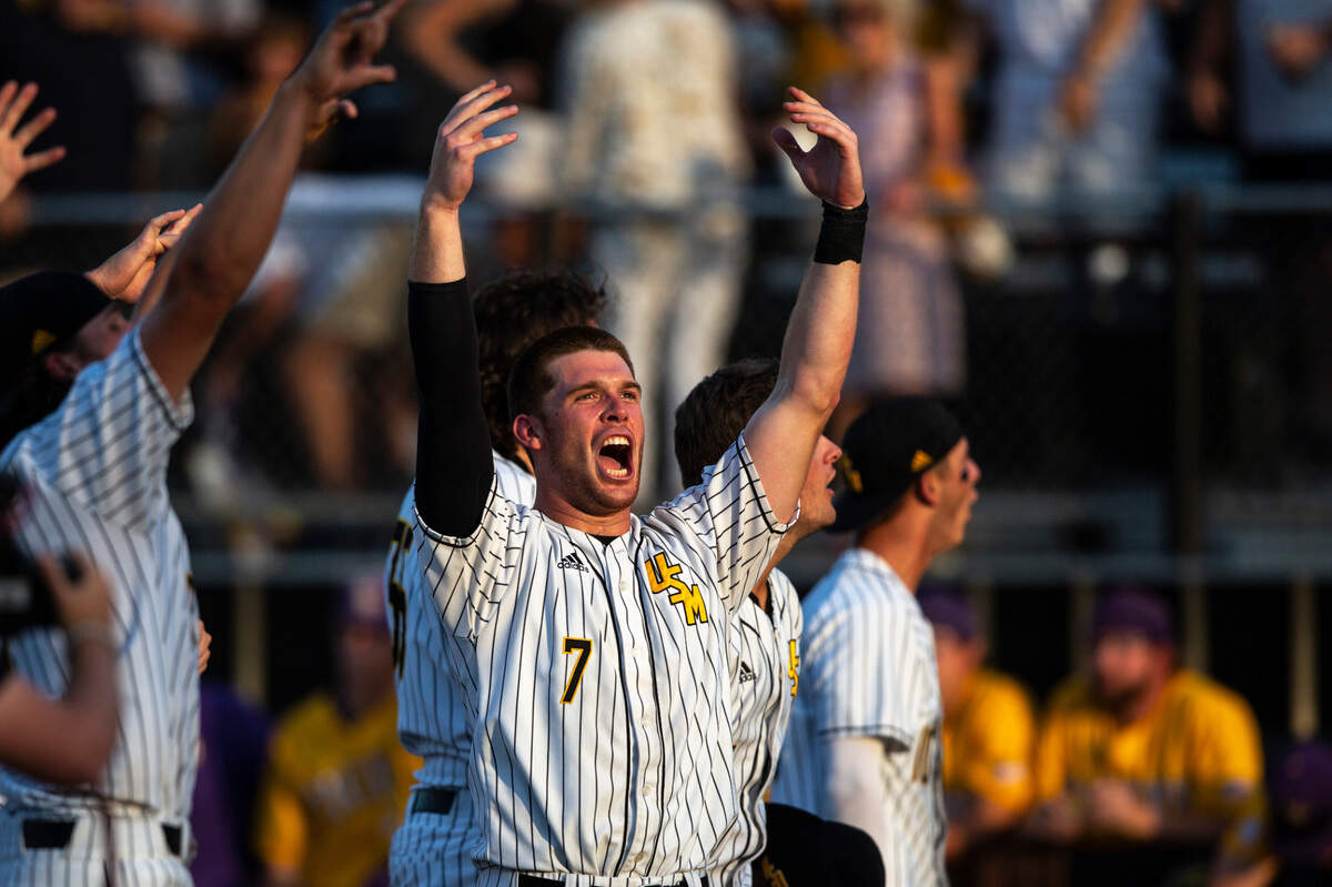 Southern Miss’s Slade Wilks cheers after defeating LSU 8-7 in the NCAA Regionals at Pete Taylor Park in Hattiesburg on Monday, June 6, 2022. Southern Miss will advance to super regionals.