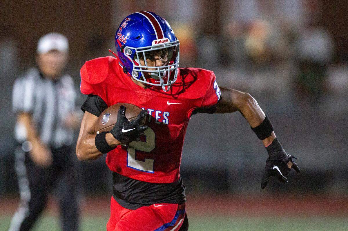 Pass Christian’s Jacquez Alexander runs the ball during a game between Pass Christian and St. Stanislaus at Francis McDonald Stadium in Pass Christian on Friday, Sept. 20, 2024.