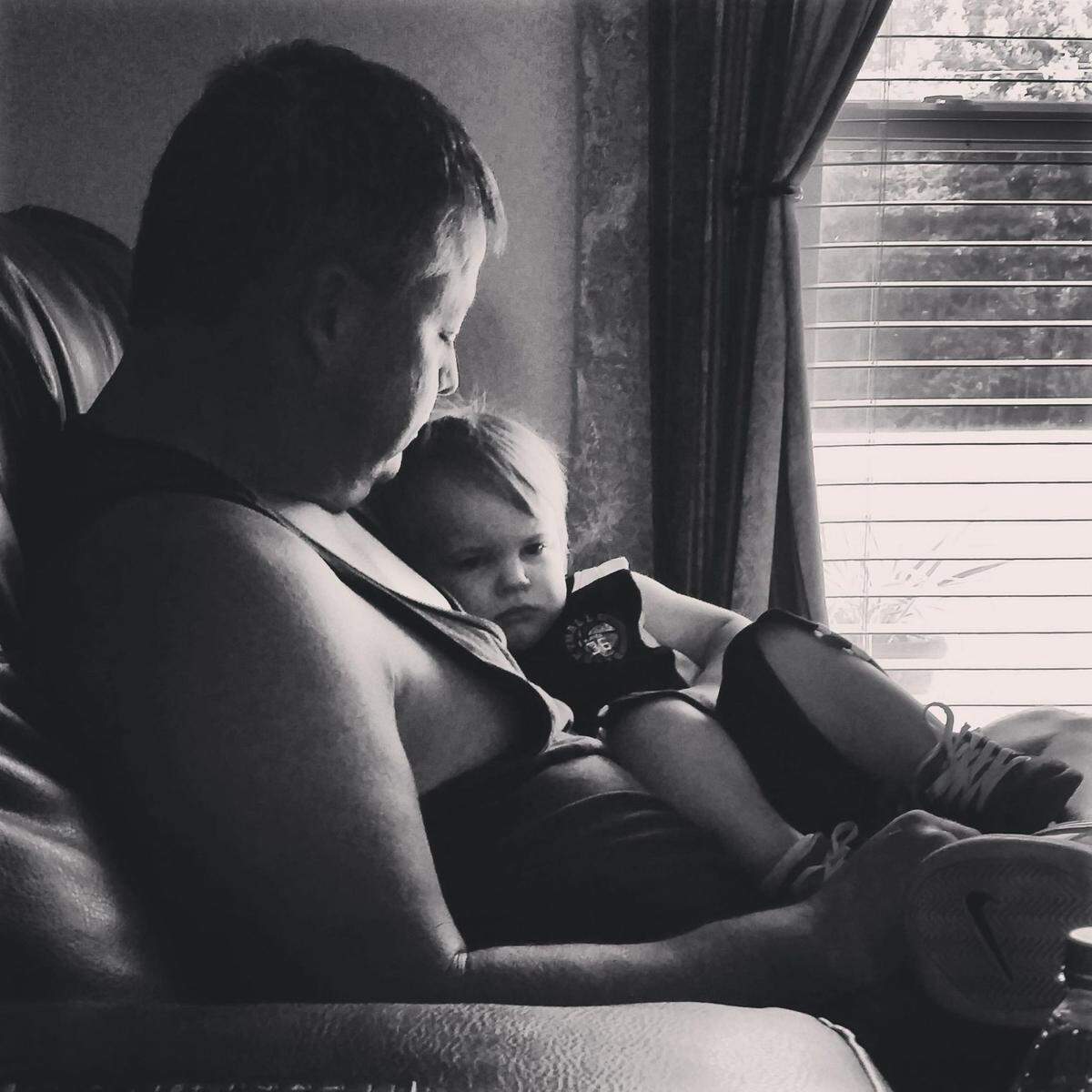 Pawpaw William Waltman holds grandson, Ryder. Waltman was killed in Wednesday’s carjacking