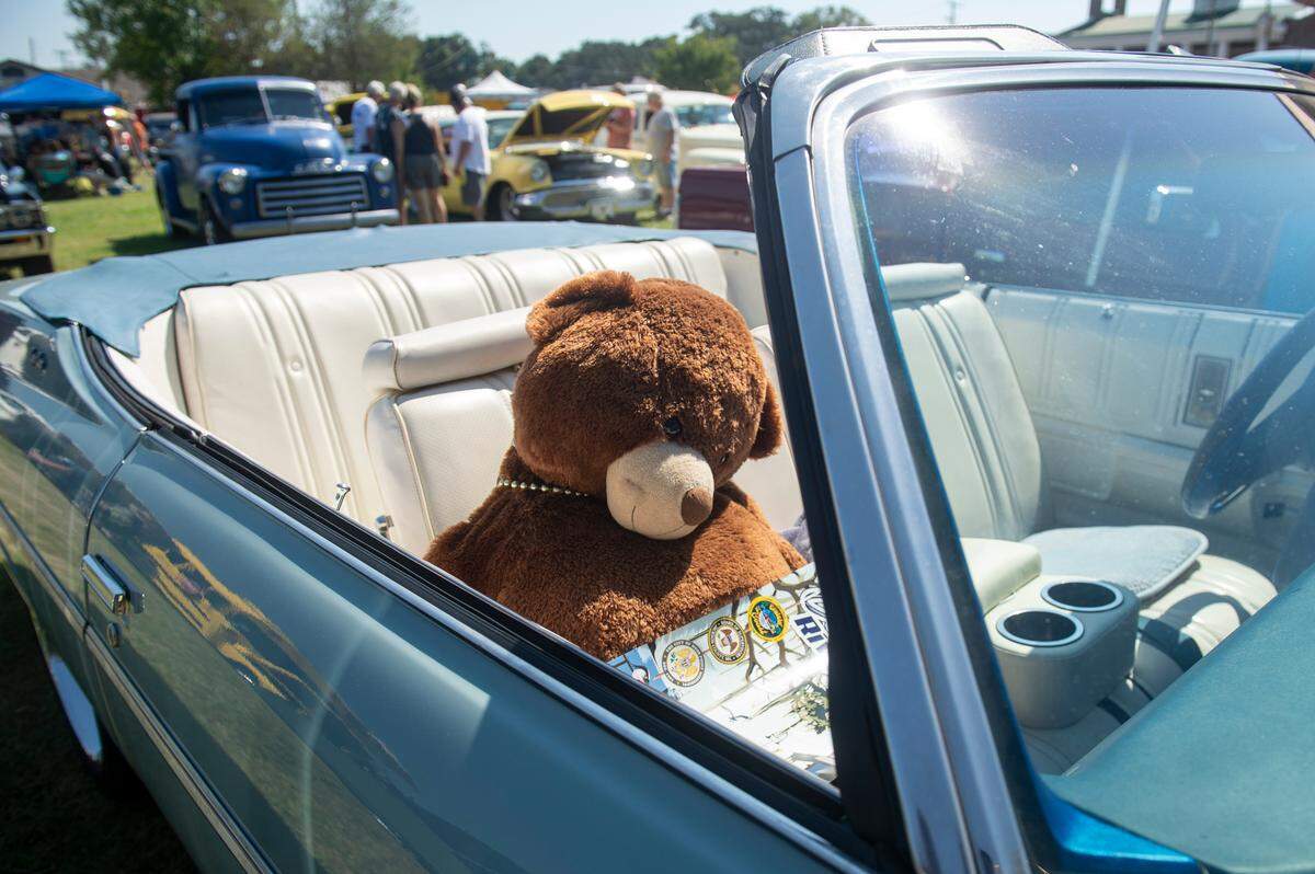 A teddy bear sits in a car in downtown Moss Point during Cruisin’ The River City, a Cruisin’ The Coast event on Tuesday, Oct. 8, 2024.