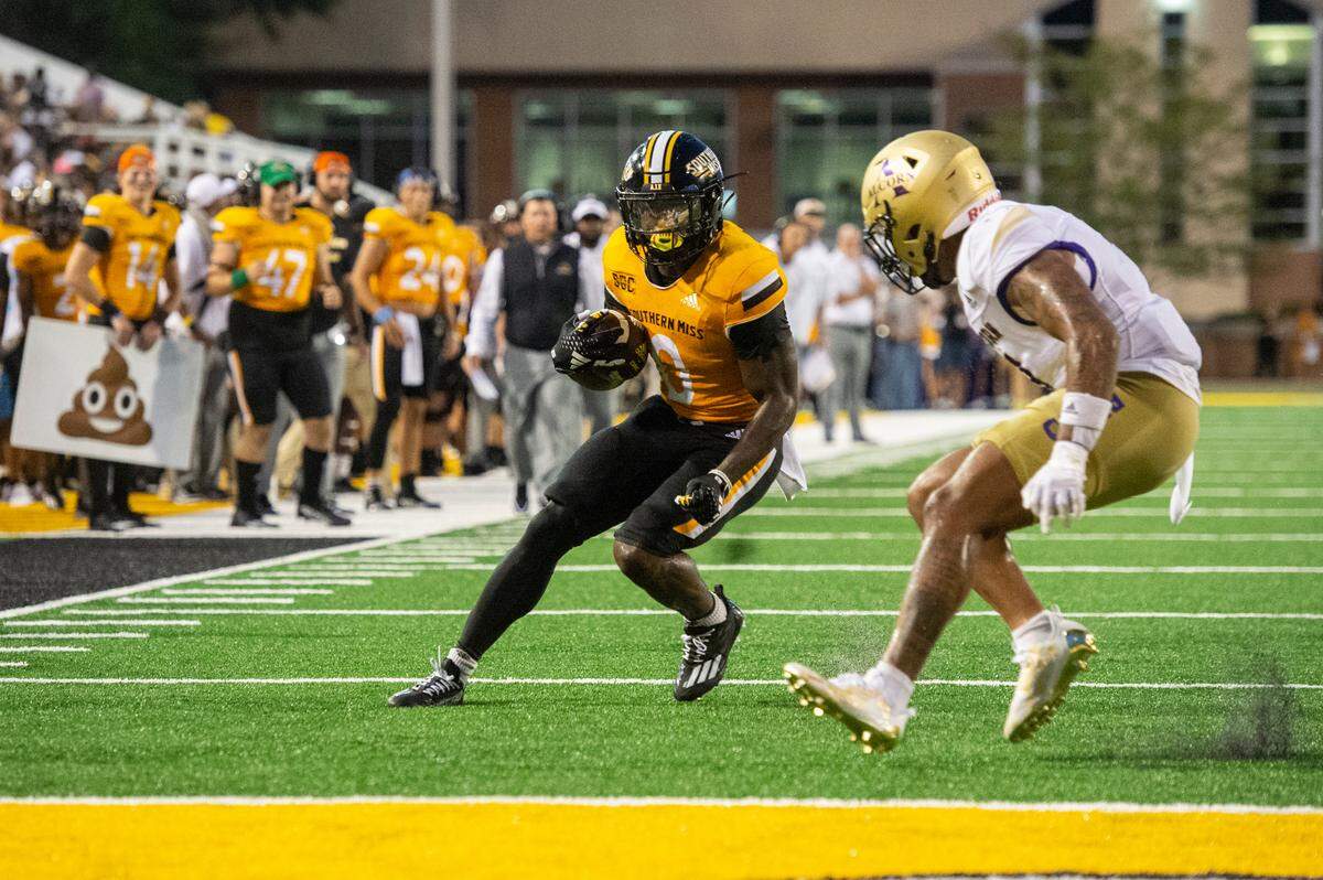 Southern Miss Golden Eagles running back Rodrigues Clark (0) runs the ball toward the end zone during a Southern Miss game at M.M. Roberts Stadium in Hattiesburg on Saturday, Sept. 2, 2023.