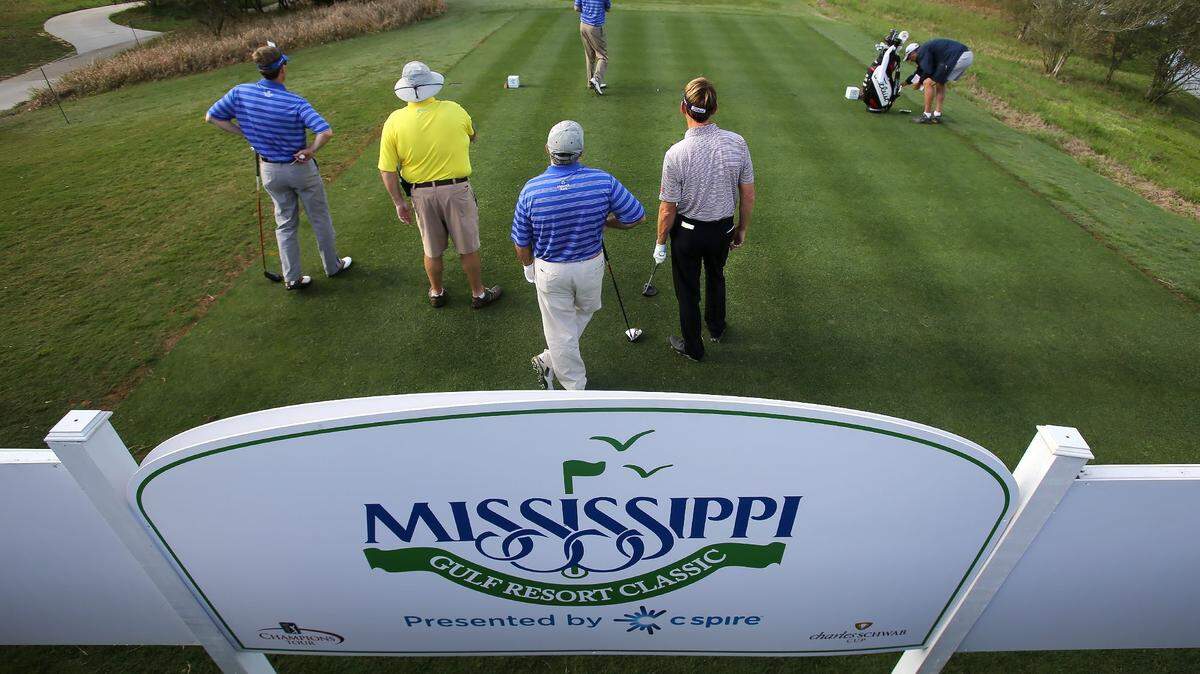 AMANDA McCOY/SUN HERALD 
 Professional golfer Brad Faxon, right, stands with his amateur partners on the first hole during the Mississippi Gulf Resort Classic Pro-Am last year at Fallen Oak Golf Club.