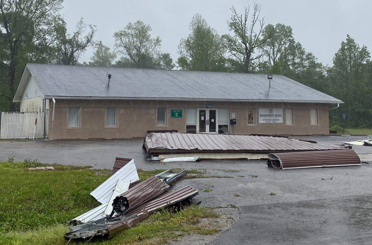 Debris from portable buildings at Gulf Coast Portable Buildings, LLC are strewn about near the Mississippi State Extension Service Office on Highway 603 North in Kiln after a possible tornado hit the area on Wednesday, April 10, 2024.