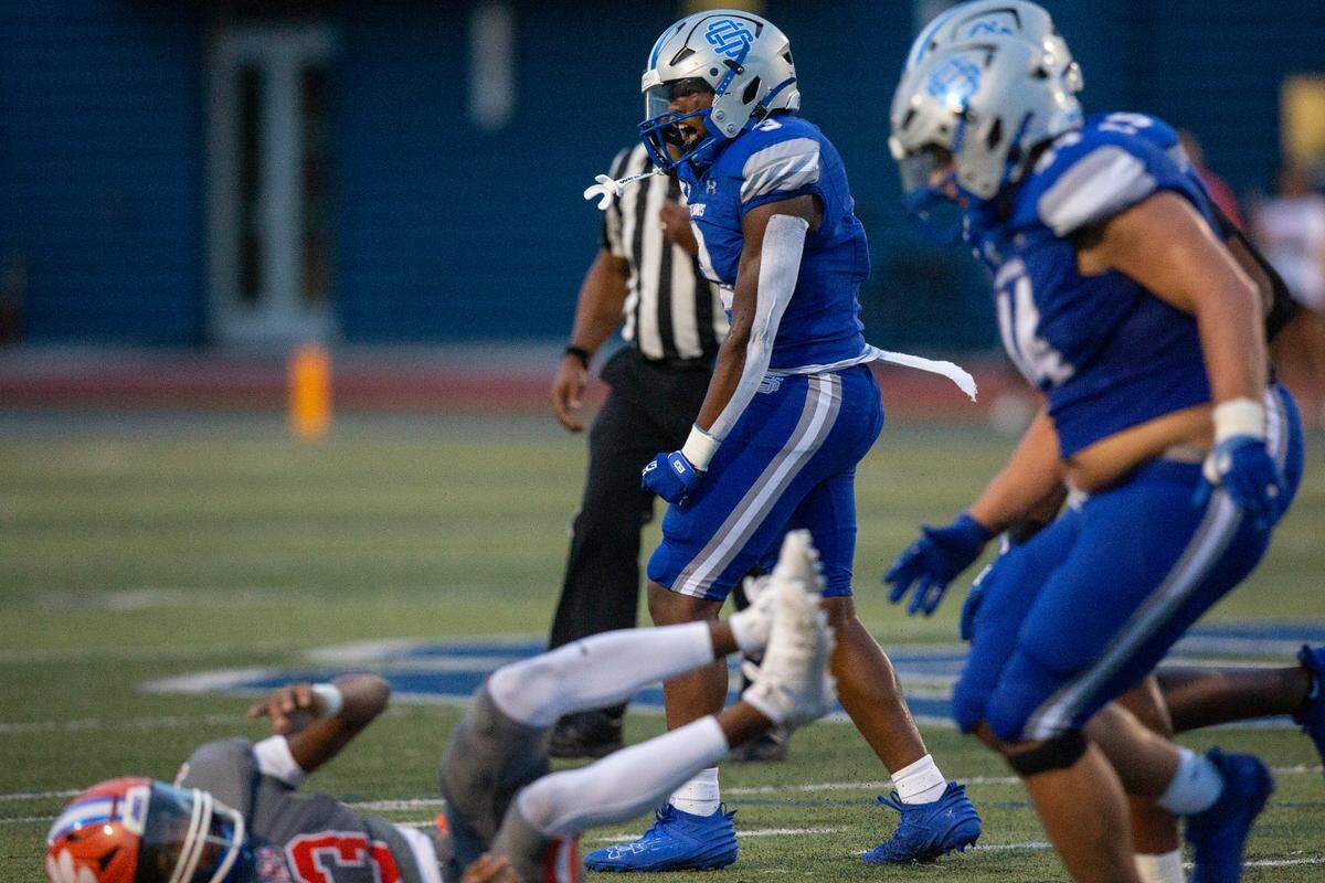 Ocean Springs’ Jacolby Bailey reacts after a play during a game against Madison Central at Greyhound Stadium in Ocean Springs on Friday, Aug. 30, 2024.