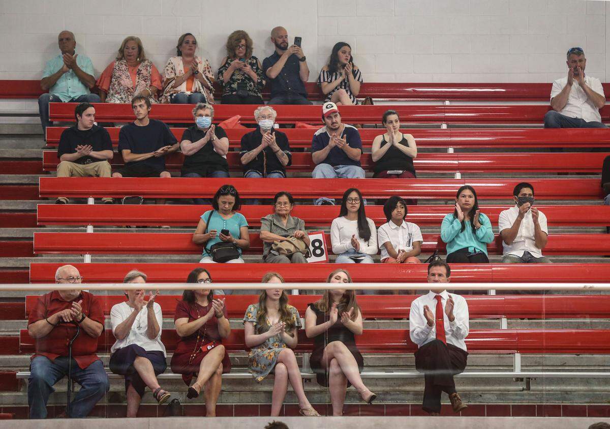 Biloxi High School assigned seating for graduating senior’s families to encourage social distancing. Each student was allowed up to six family members to attend their graduation session.
