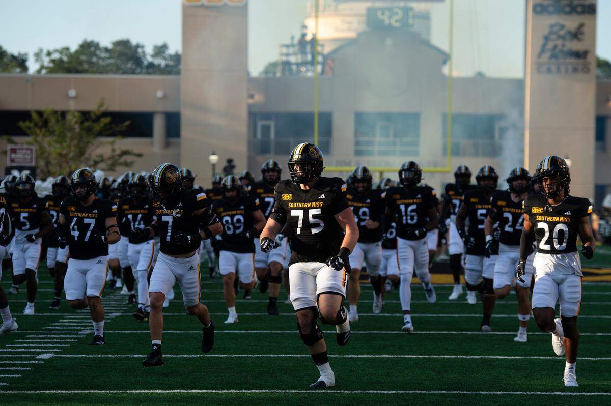 Southern Miss runs onto the field before a game between Southern Miss and Southeastern Louisiana at M.M. Roberts Stadium in Hattiesburg on Saturday, Sept. 7, 2024.