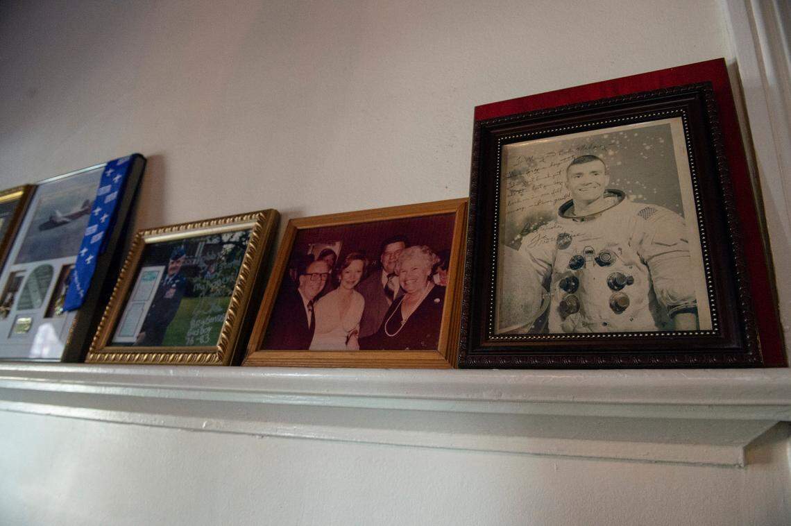 Apollo 13 astronaut and Biloxi native Fred Haise, right, autographed a photo displayed at Mary Mahoney’s restaurant in Biloxi. Owner Bobby Mahoney keeps photos of many of the celebrities who have visited the establishment.
