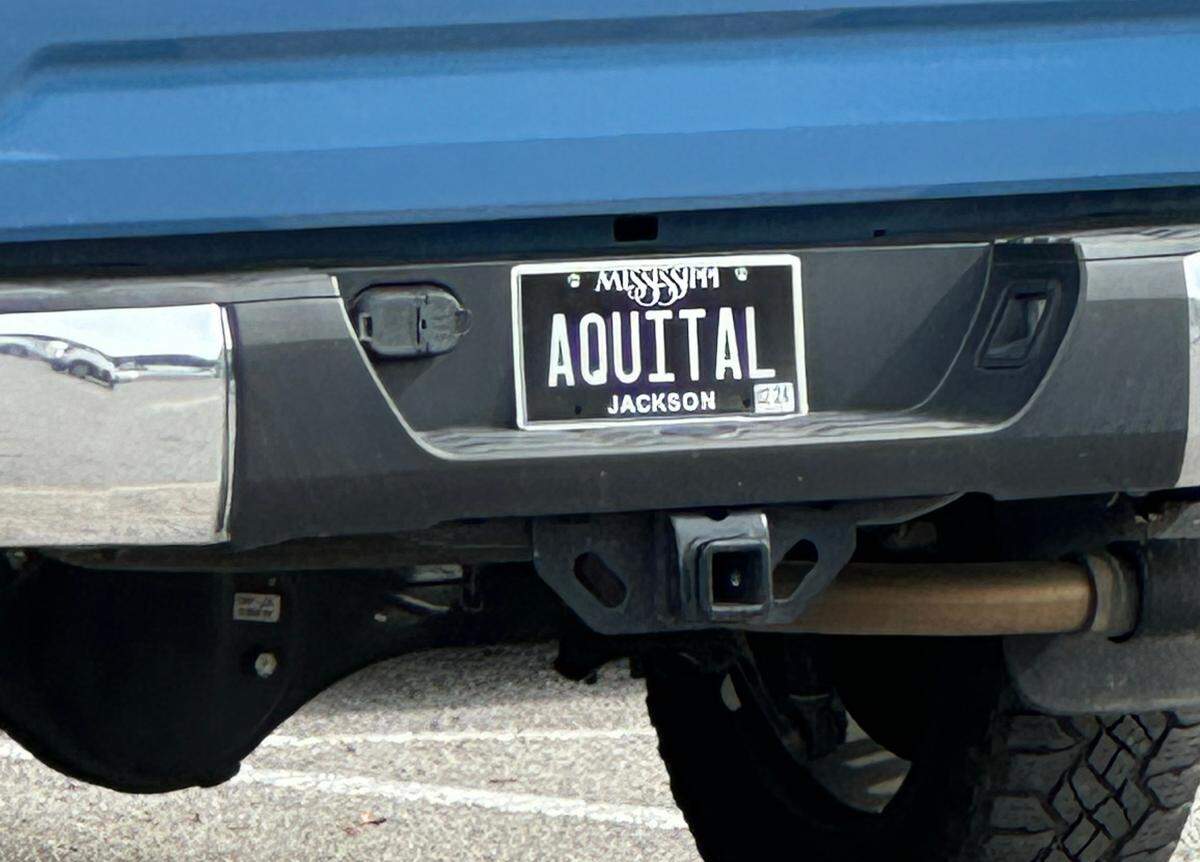 I saw this “AQUITAL” license plate in the parking lot of a courthouse.