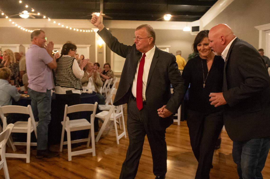 Jackson County Sheriff Mike Ezell walks into the Magnolia Ballroom with his wife, Suzette, as he wins Mississippi’s 4th Congressional District race, on election night in Pascagoula on Tuesday, Nov. 8, 2022.