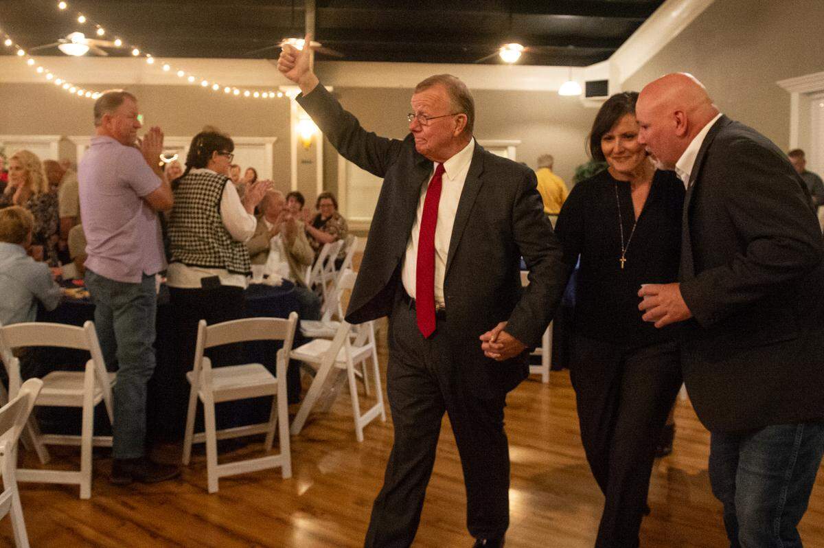 Jackson County Sheriff Mike Ezell walks into the Magnolia Ballroom with his wife, Suzette, as he wins Mississippi’s 4th Congressional District race, on election night in Pascagoula on Tuesday, Nov. 8, 2022.