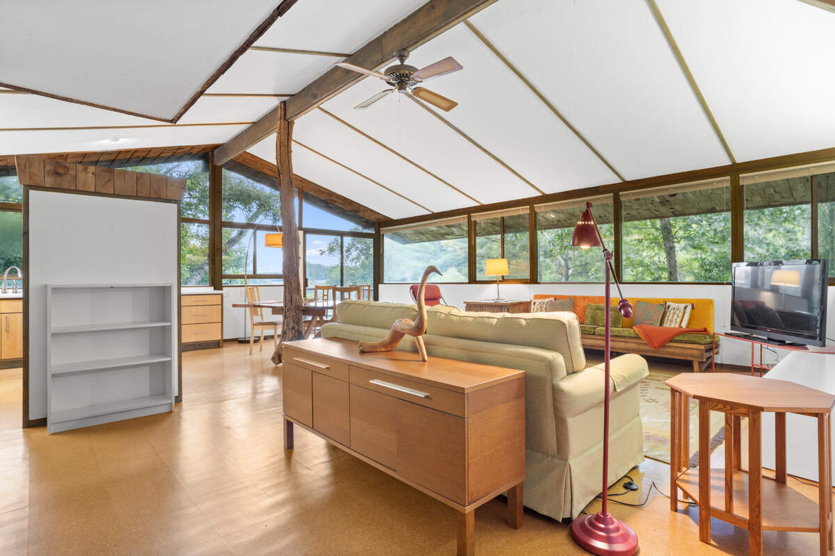 This issue house for sale on Brumbaugh Road features an open floor plan with ample windows that allow light to pour in. The house sits on Davis Bayou in Ocean Springs.